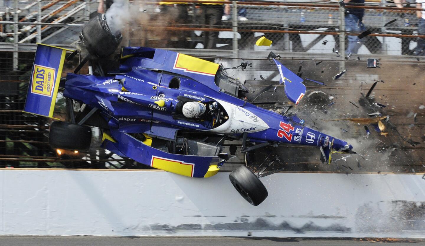 Mike Conway of England crashes in the third turn in the closing laps of the Indianapolis 500 on May 30, 2010,