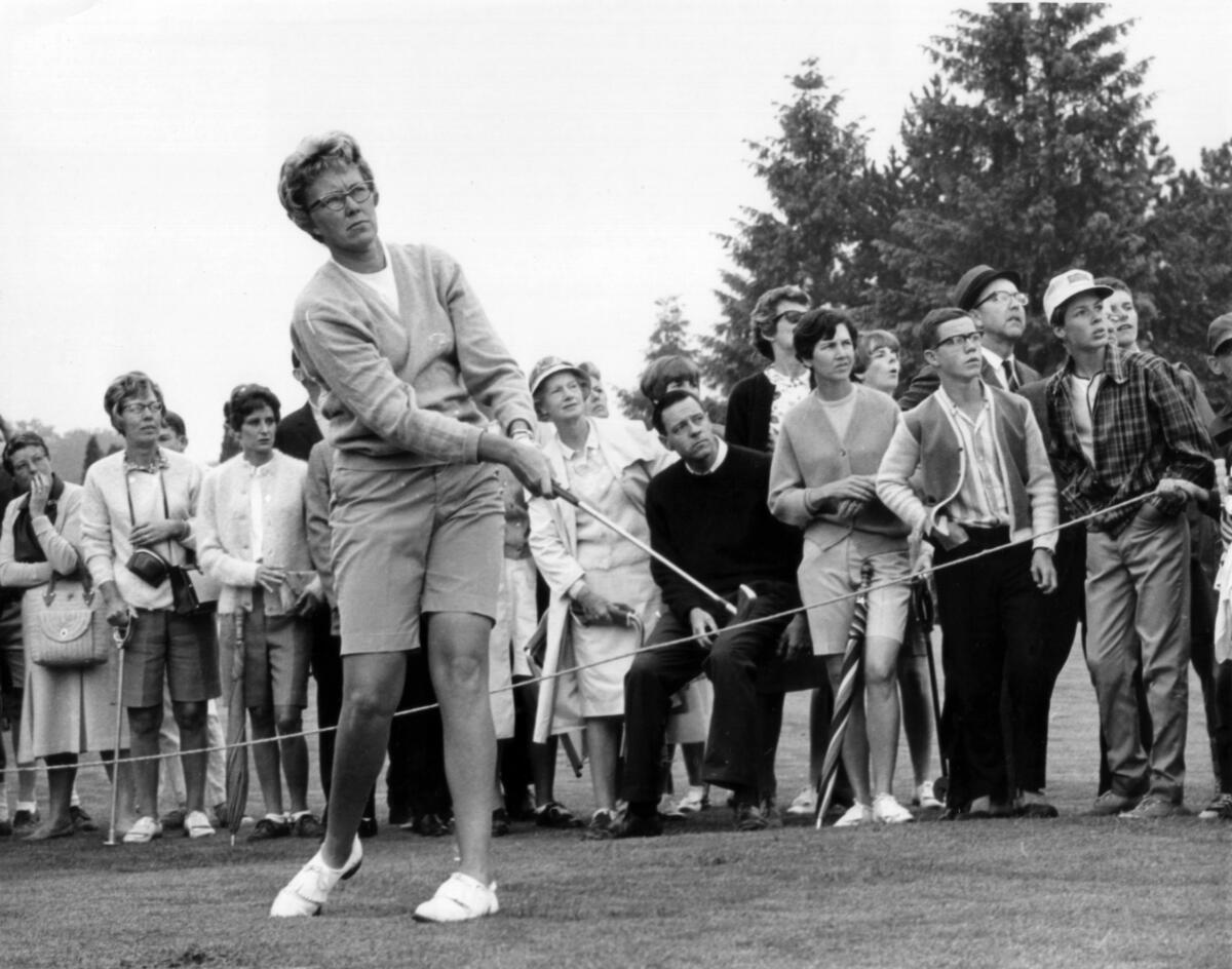 The gallery follows Mickey Wright's iron shot from the fairway at the Toronto Golf Club in 1967.
