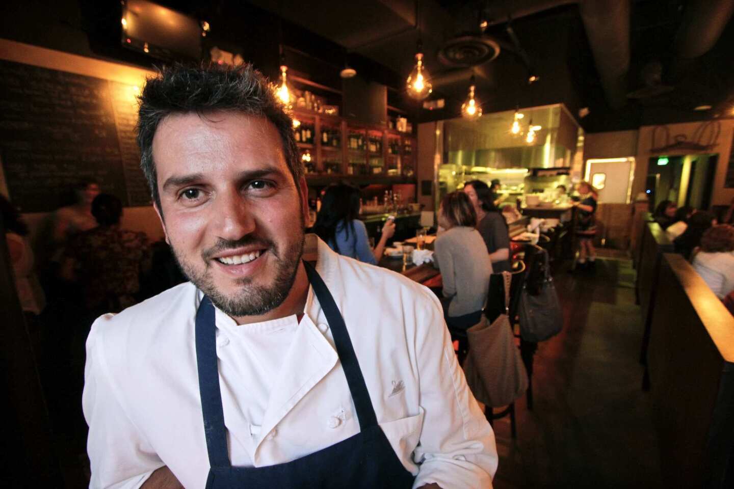 New chef Perfecto Rocher is in transition at Lazy Ox Canteen until his new paella restaurant opens in Santa Monica.