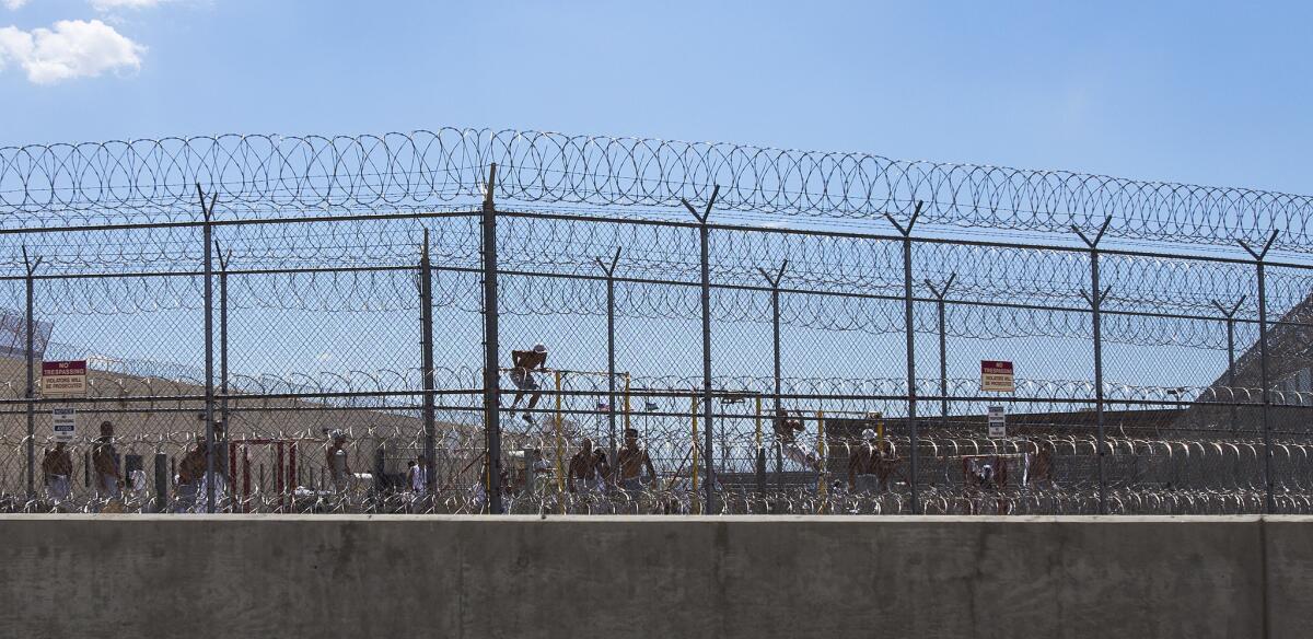Immigrants being held at the Adelanto Detention Facility, seen in 2014, have ended a hunger strike, officials said Monday.