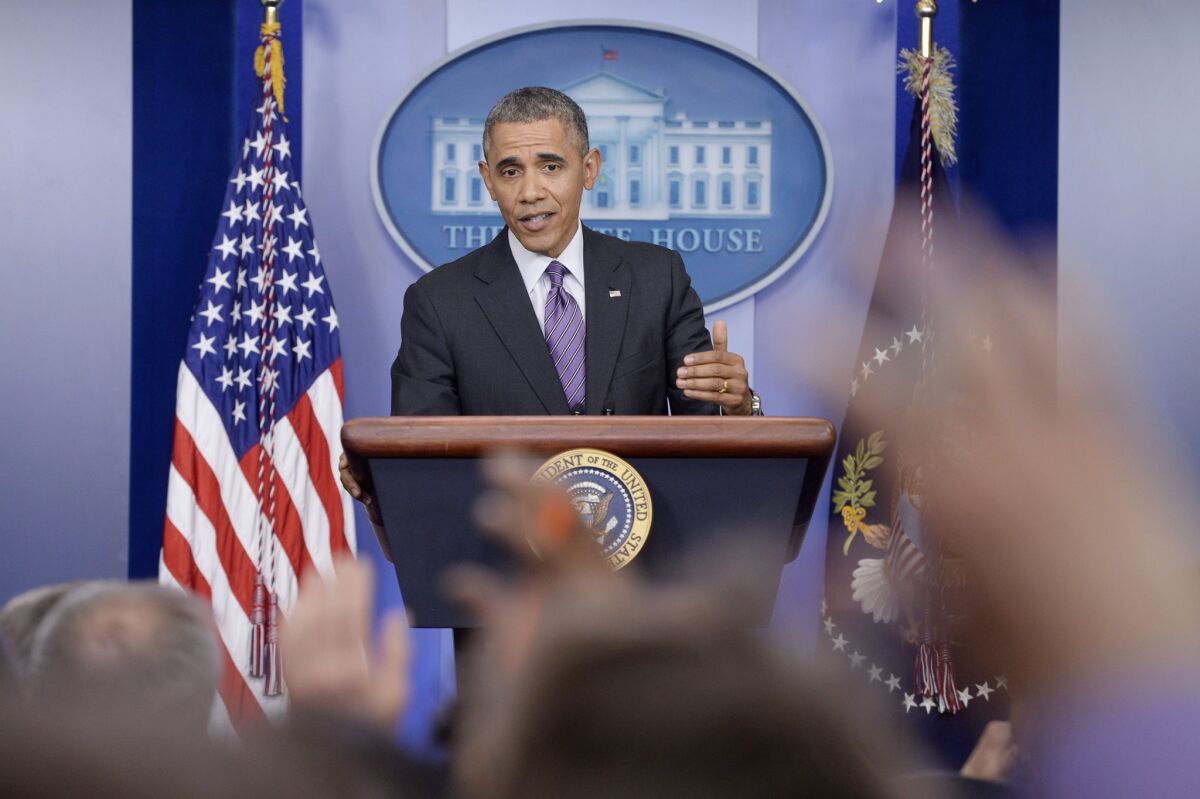 President Obama answers questions from reporters on the Affordable Care Act.