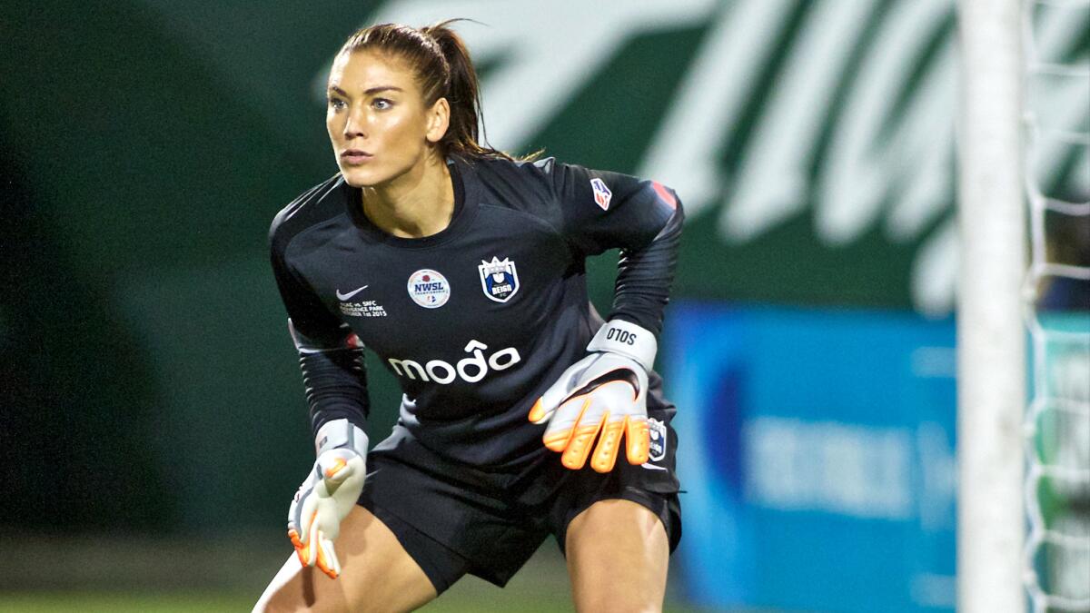 Hope Solo watches for a shot on goal during a Reign game last October.