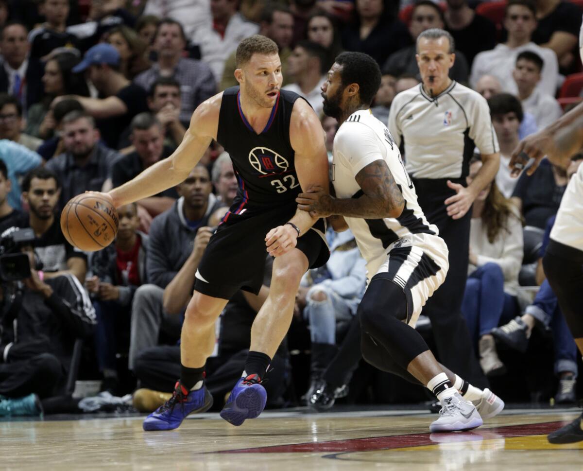 Clippers forward Blake Griffin drives to the basket as Miami Heat forward James Johnson defends during the second half on Dec. 16.