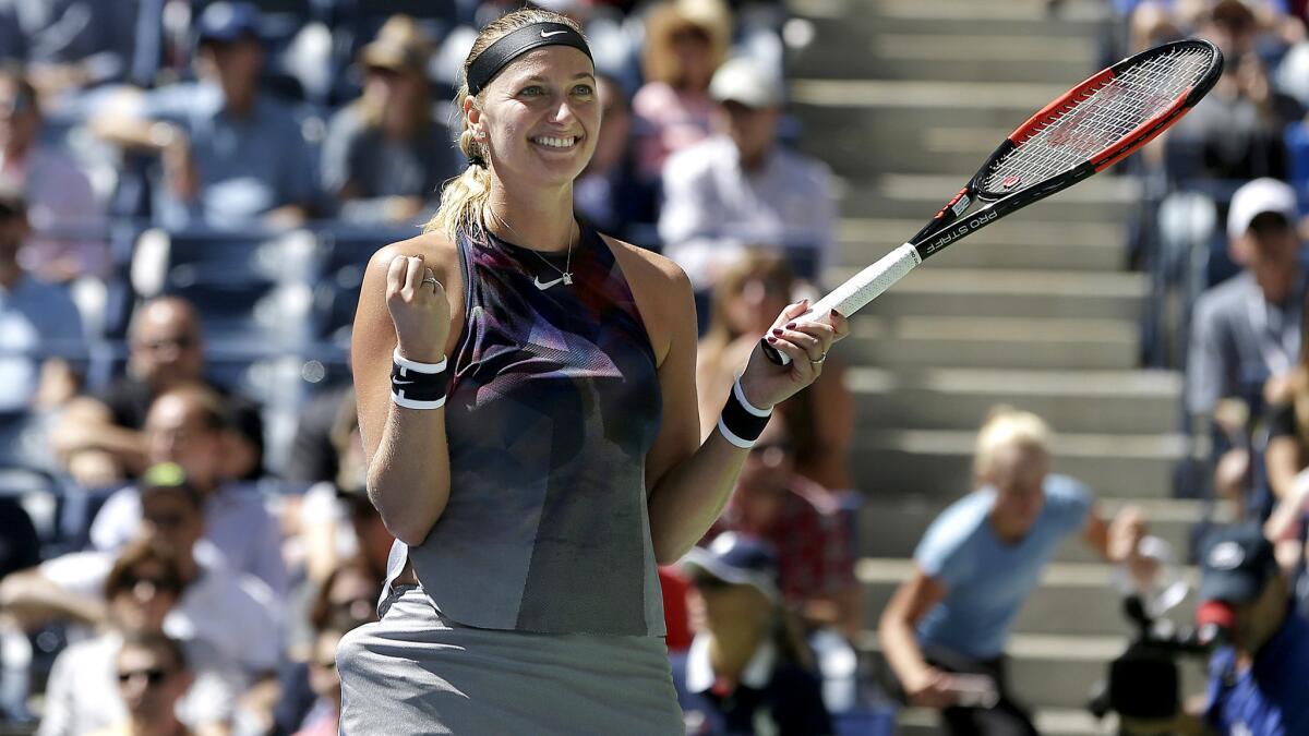 Two-time Wimbledon champion Petra Kvitova celebrates after defeating Caroline Garcia at the U.S. Open on Friday.