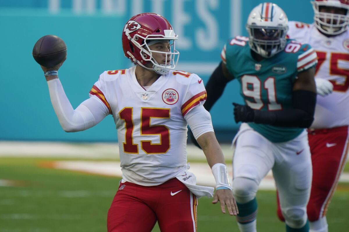Kansas City Chiefs quarterback Patrick Mahomes looks to pass against the Miami Dolphins.