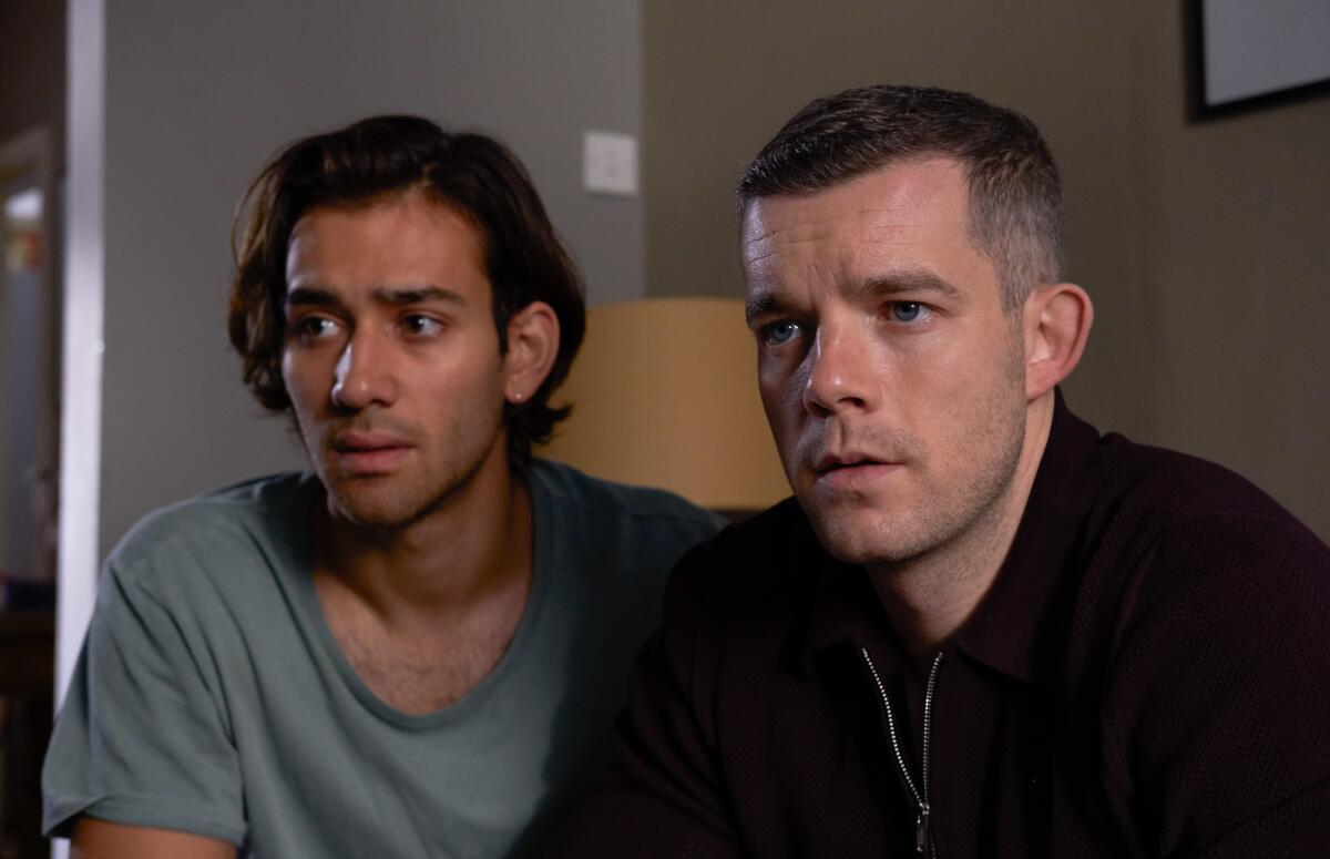 Maxim Baldry, left, and Russell Tovey in "Years and Years." 