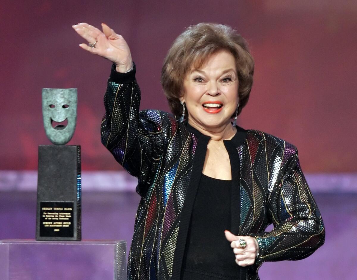 Shirley Temple Black, pictured in 2006 accepting the Screen Actors Guild life achievement award, and the family of the late actress has made a $5-million gift to the Academy Museum, leaders said Thursday.