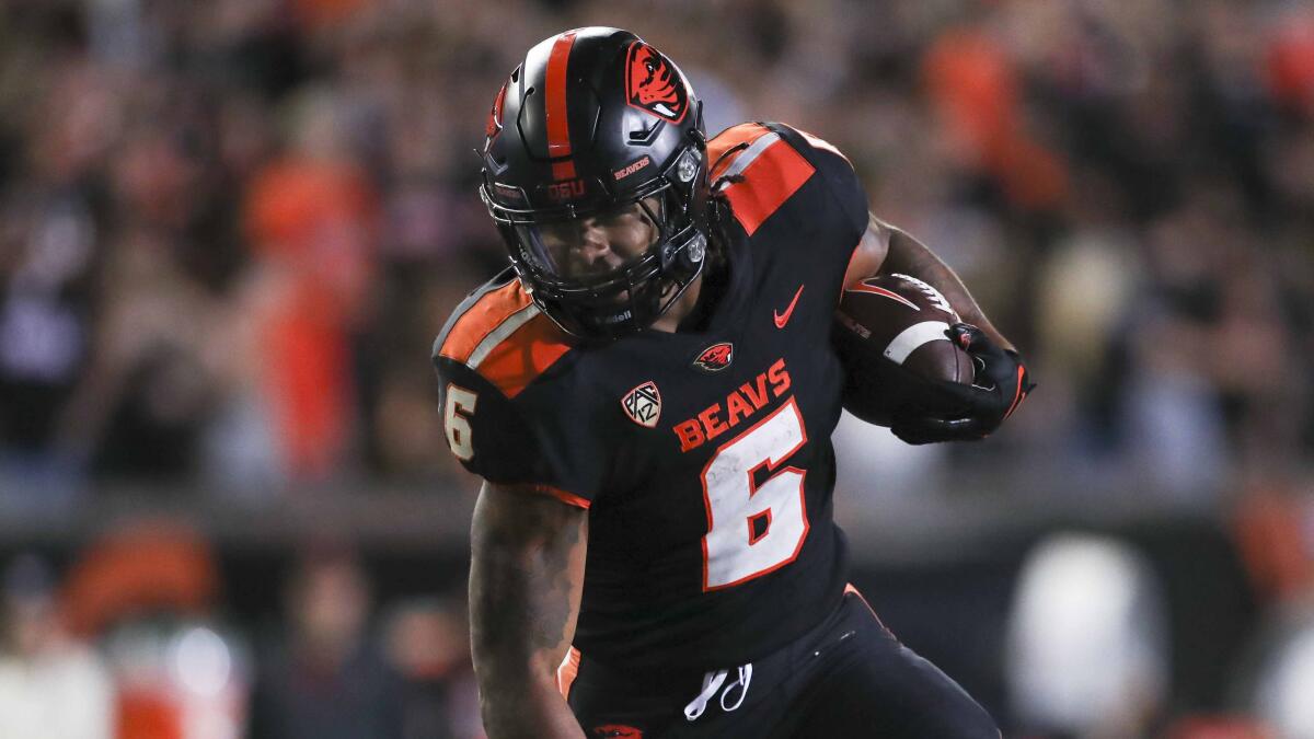 Oregon State running back Damien Martinez carries the ball against Boise State on Sept. 3.