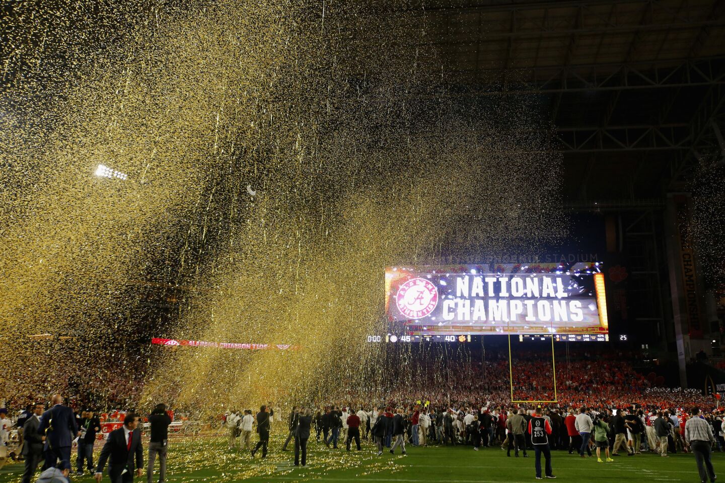 Confetti falls as the Alabama Crimson Tide celebrates after defeating the Clemson Tigers in the 2016 College Football Playoff championship game.