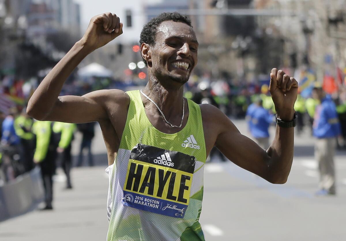 Ethiopia's Lemi Berhanu Hayle celebrates after winning the 120th Boston Marathon on Monday.