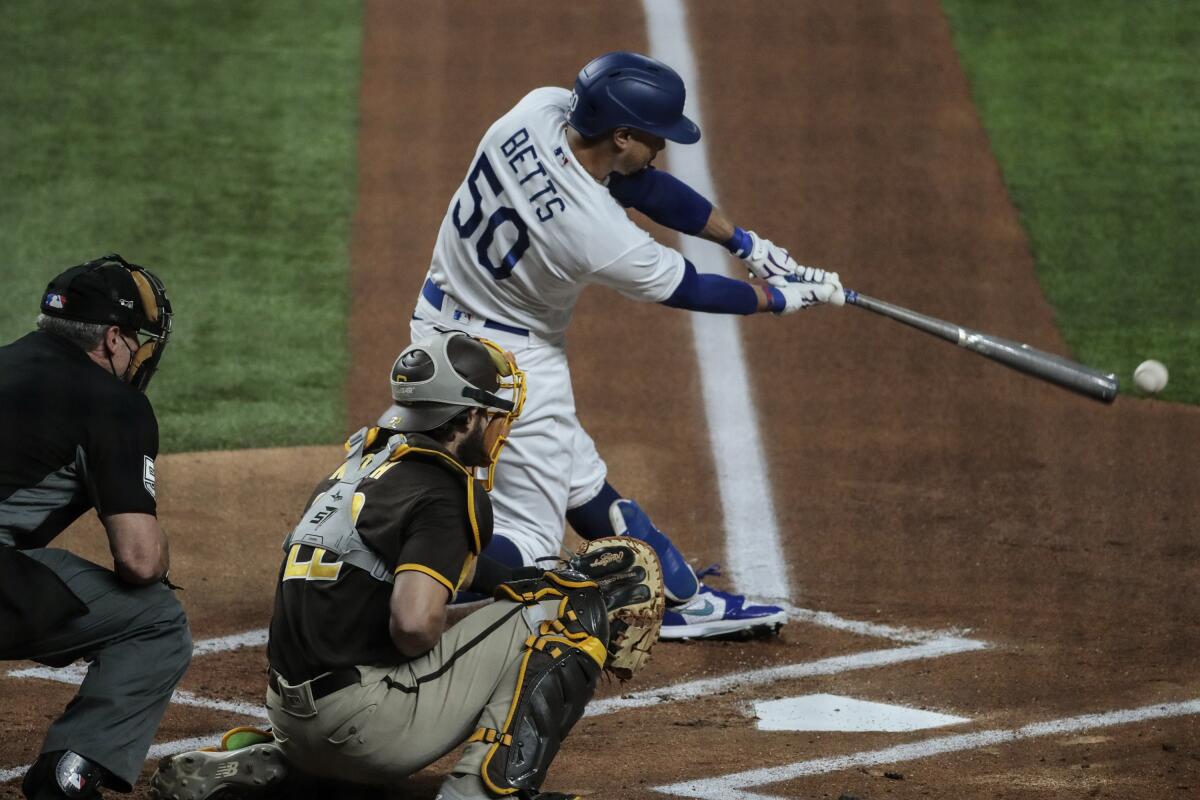 Dodgers right fielder Mookie Betts singles during Game 2 of the NLDS against the Padres on Wednesday.