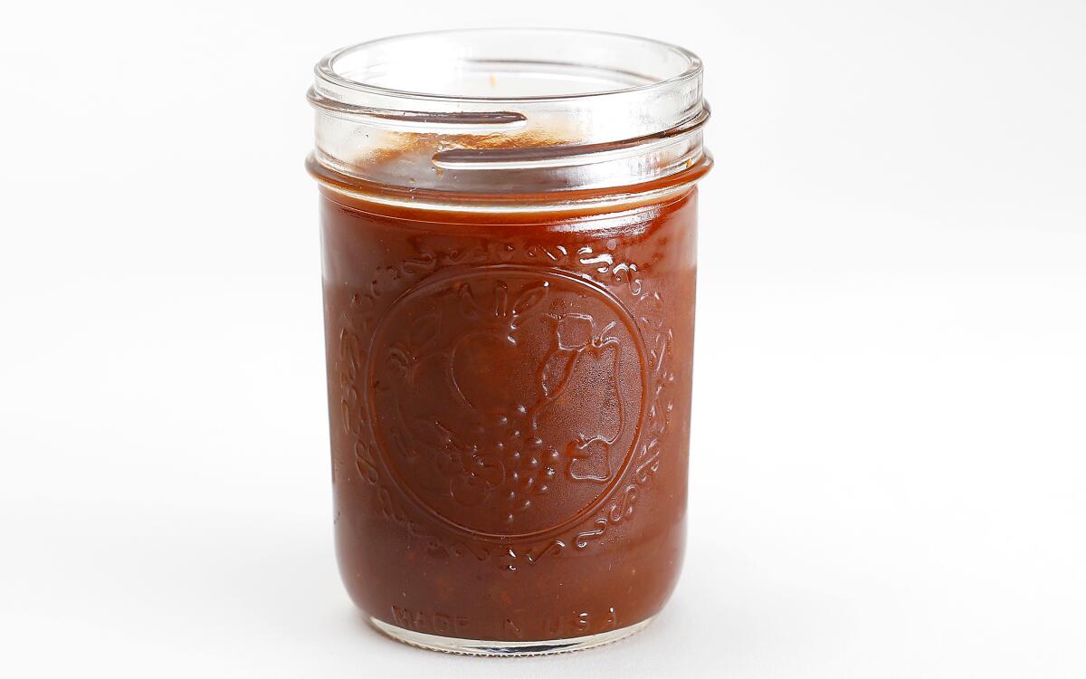 Cola is used as the sweetener in this whiskey-spiked barbecue sauce based on the ketchup-y sauces beloved in the Midwest.