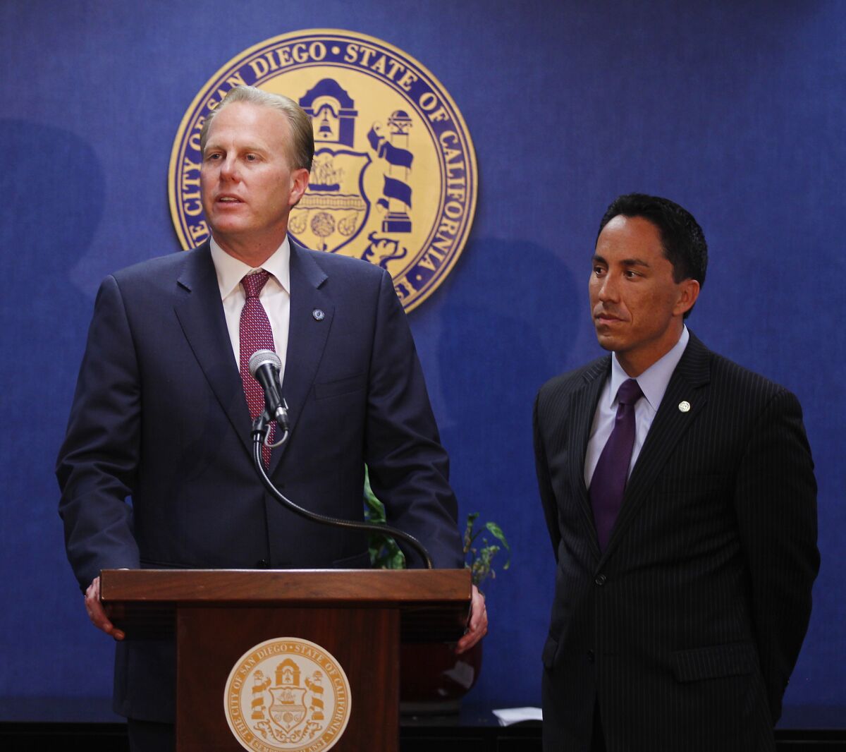 Mayor-elect Kevin Faulconer appeared with then-interim Mayor Todd Gloria in February 2014.