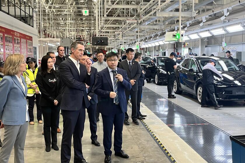 Gov. Gavin Newsom tours the Tesla gigafactory in Shanghai on Sunday Oct. 29, 2023. Laurel Rosenhall, Los Angeles Times