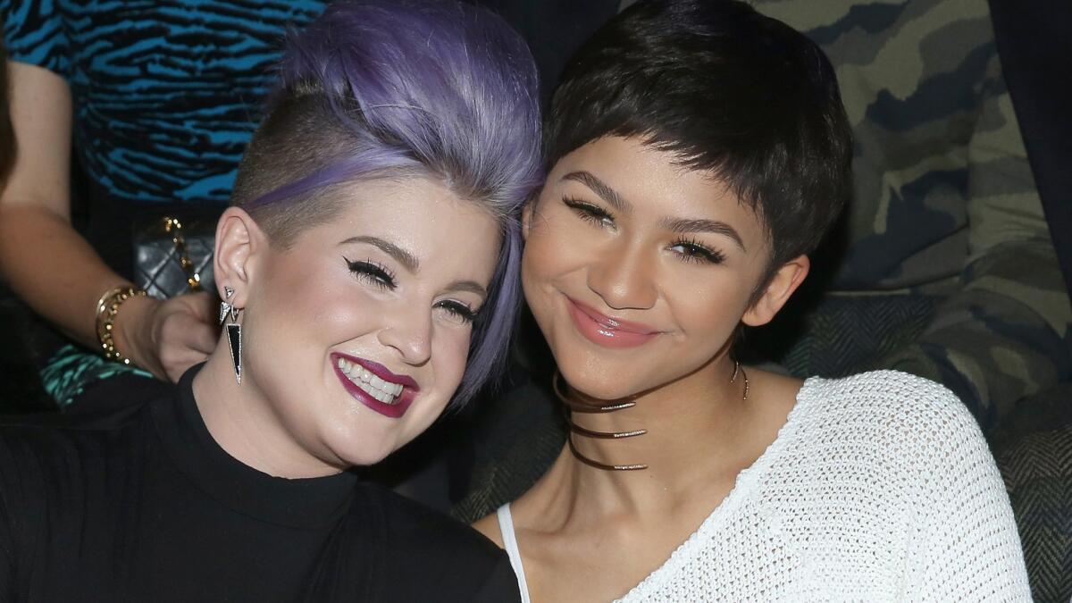 Kelly Osbourne, left, and Zendaya were first-row buddies at the Christian Siriano fashion show on Valentine's Day in New York City.