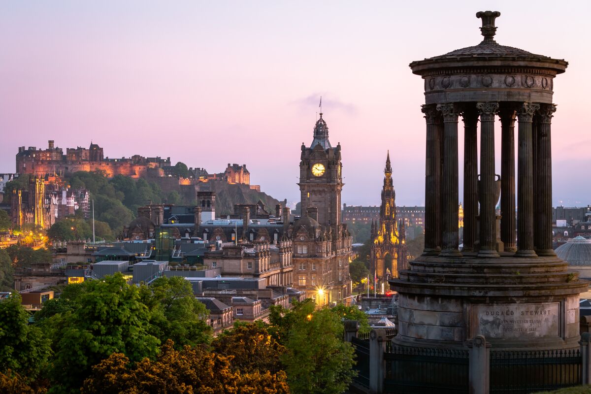 From atop Calton Hill at sunset, Edinburgh promises memorable culinary experiences.