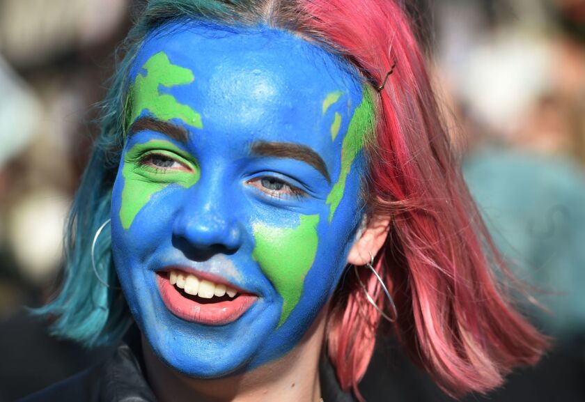 A student takes part in a climate change protest in London in February. 