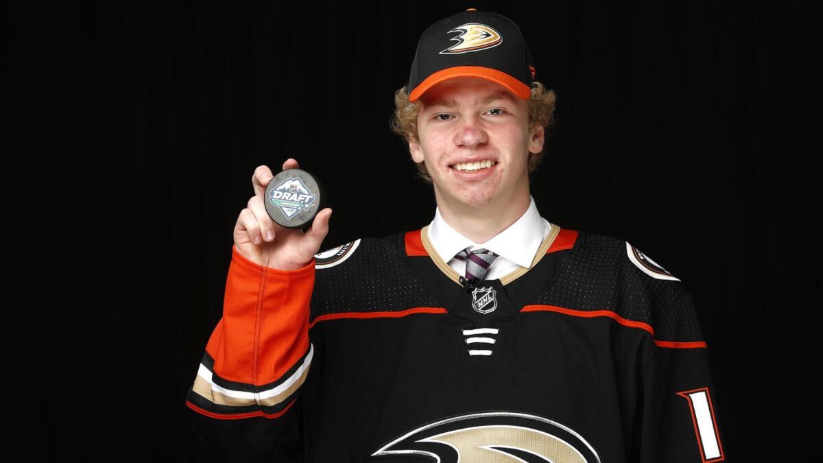 Jackson Lacombe poses for a photo after being selected by the Ducks on Saturday.