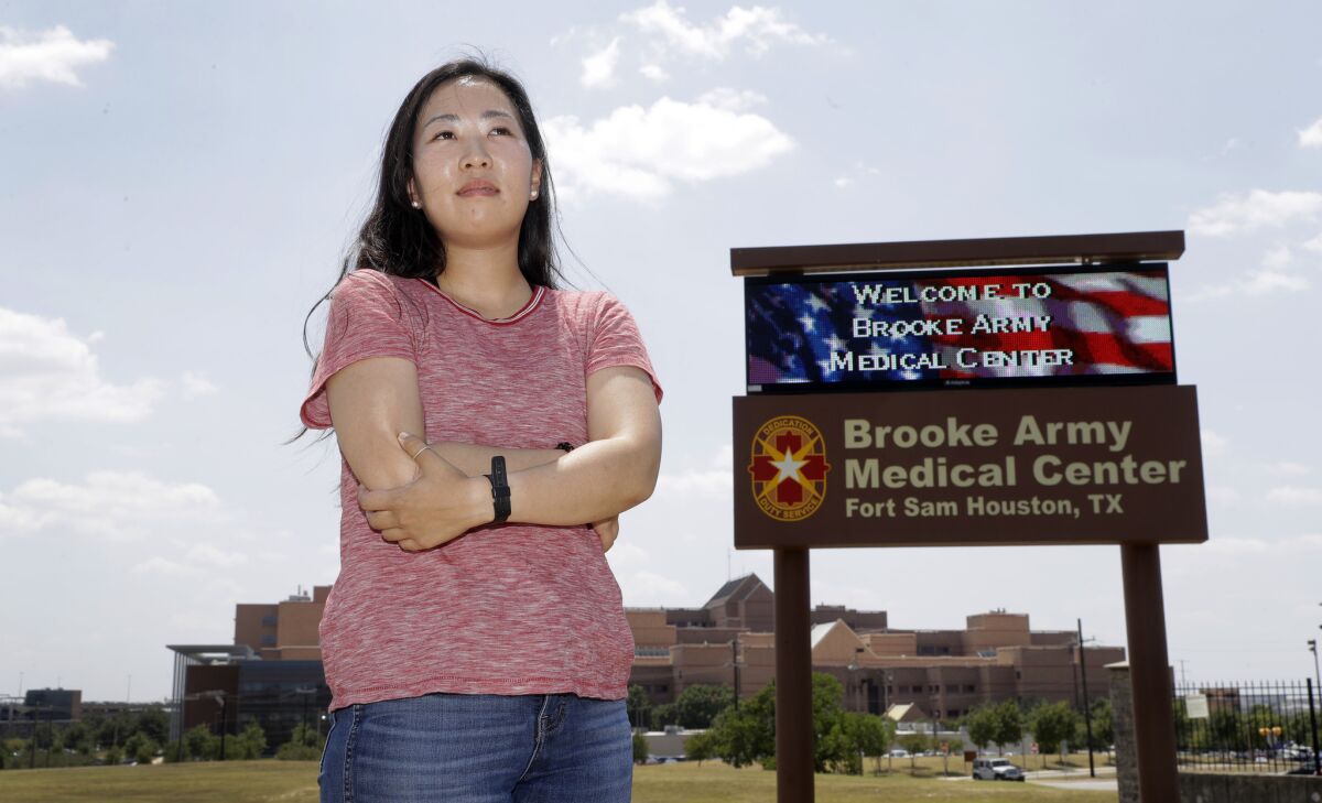 Yea Ji Sea, 29, at Ft. Sam Houston in San Antonio, was born in South Korea and served for more than four years in the U.S. Army. She's suing for a response to her citizenship application after the military discharged her.