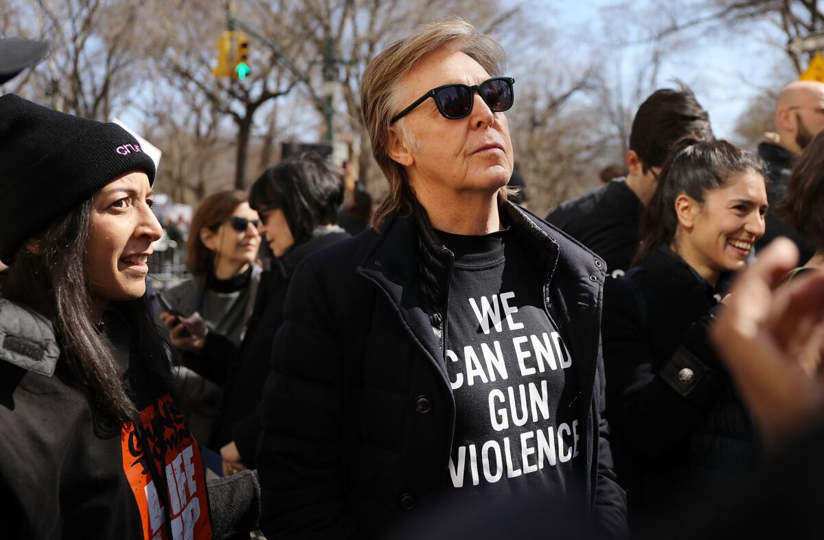 NEW YORK: Musician Paul McCartney joins thousands of people marching against gun violence in Manhattan.