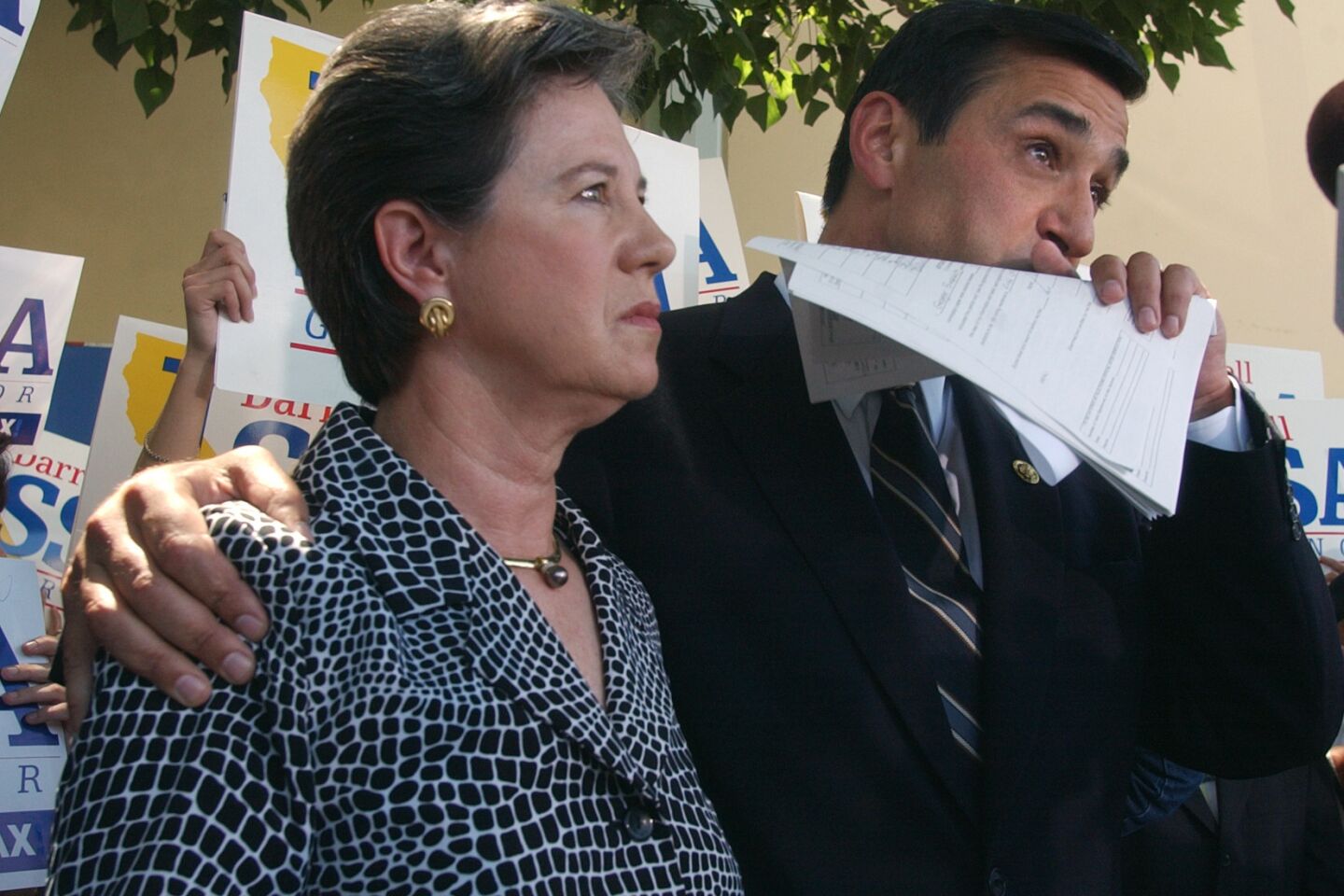 Rep. Darrell Issa, with his wife, Kathy, choked up on Aug. 7, 2003, as he announced he would not be a candidate for governor. Issa bankrolled the successful petition drive to recall Democratic Gov. Gray Davis.