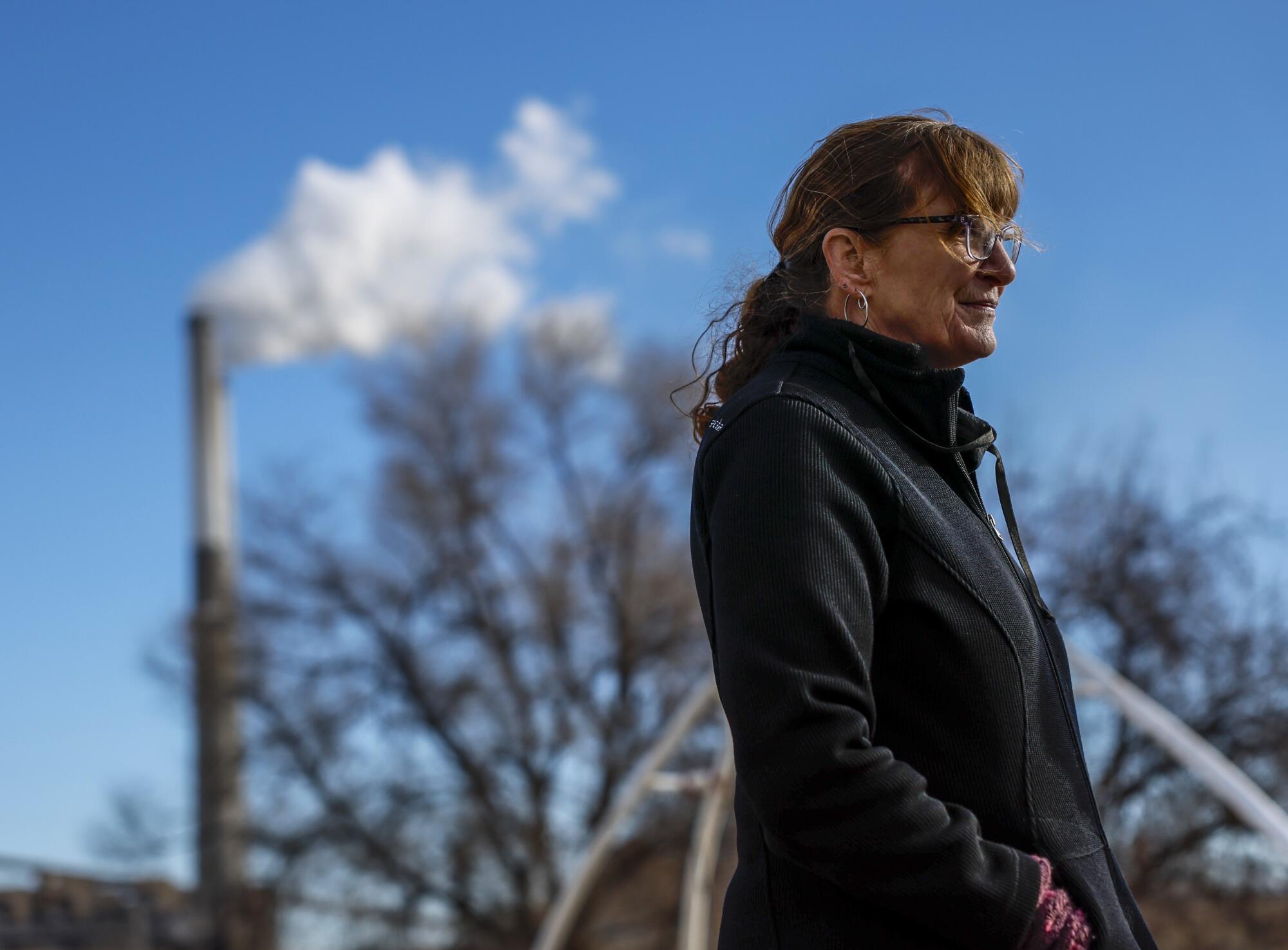 Climate activist Anne Hedges stands in a public park near the Colstrip power plant.