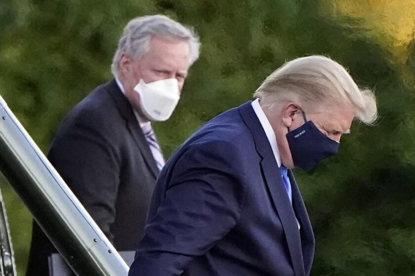 President Donald Trump arrives at Walter Reed National Military Medical Center, in Bethesda, Md., Friday, Oct. 2, 2020, on Marine One after he tested positive for COVID-19. (AP Photo/Jacquelyn Martin)