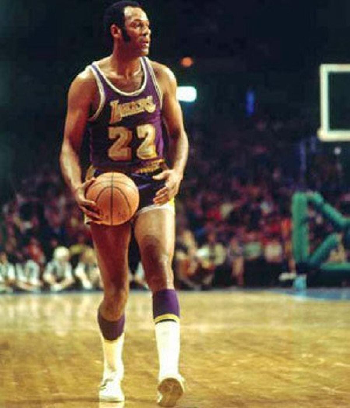 Lakers forward Elgin Baylor averaged 27.4 points and 13.5 rebounds a game during his 14-year career.