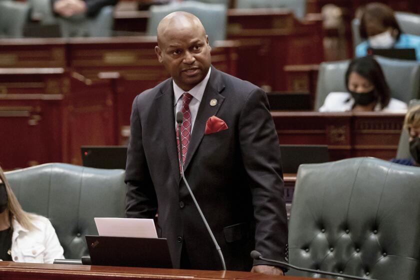 FILE - Illinois Speaker of the House Emanuel "Chris" Welch, D-Hillside, speaks on the floor of the House of Representatives, Sept. 9, 2021, at the state Capitol in Springfield, Ill. Staff members working for Welch on Friday, May 31, 2024, filed a lawsuit demanding the right to negotiate working conditions as a union, something Welch said he supported last fall when he sponsored legislation to allow it. (Justin L. Fowler/The State Journal-Register via AP, File)