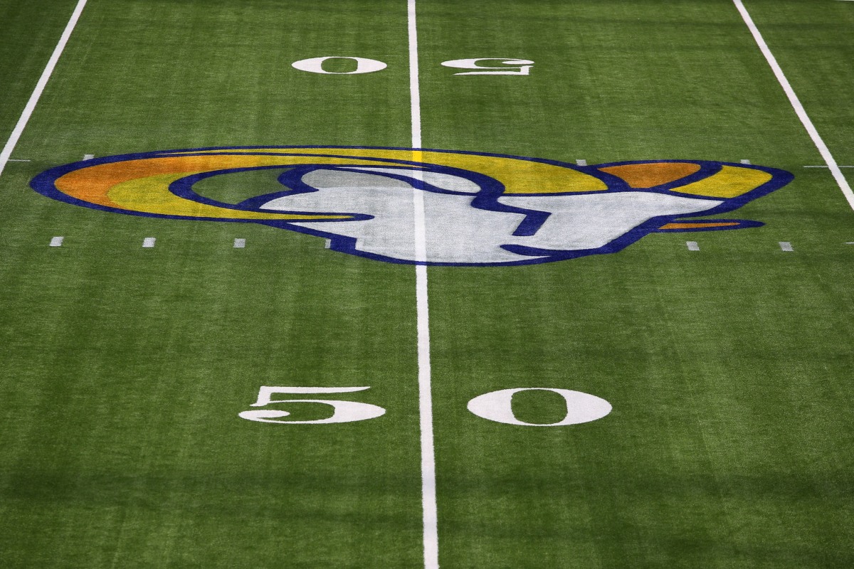 The Rams logo painted at midfield at SoFi Stadium.