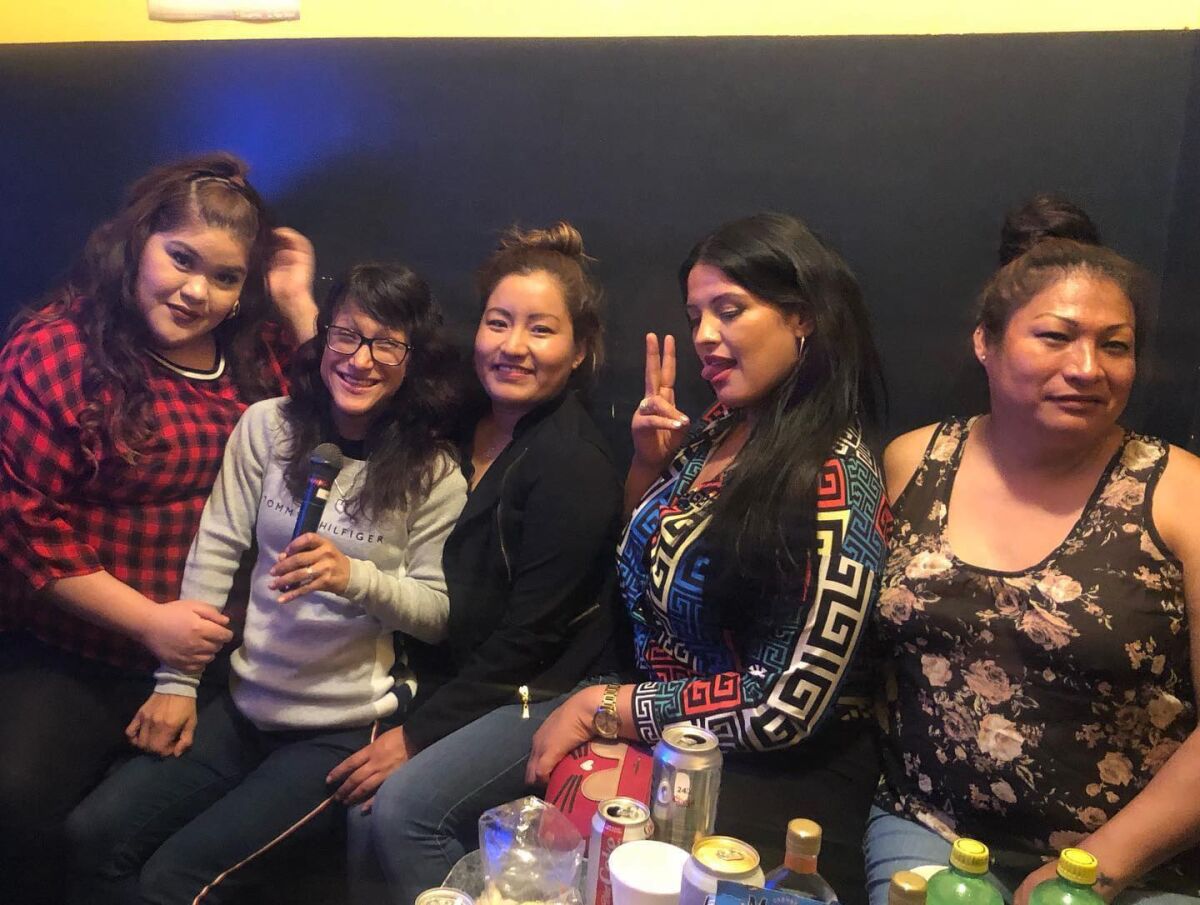 Angela Martinez, far right, and la pandilla would go bowling or sing karaoke every Thursday night.