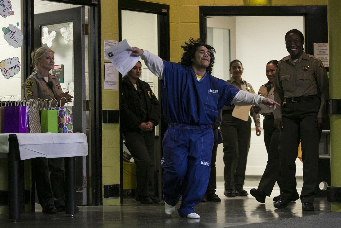 Jasmin Matau makes a grand entrance as she takes the stage to compete in the "No Bars on Talent Show" at the Century Regional Detention Facility. Matau sang a stirring rendition of the John Legend song "So High."