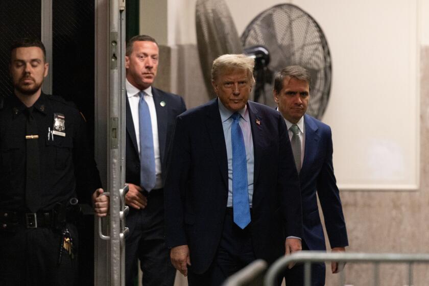 NEW YORK, NEW YORK - APRIL 26: Former US President Donald Trump returns from a break for his trial for allegedly covering up hush money payments at Manhattan Criminal Court on April 26, 2024 in New York City. Former U.S. President Donald Trump faces 34 felony counts of falsifying business records in the first of his criminal cases to go to trial. (Photo by Jeenah Moon-Pool/Getty Images)