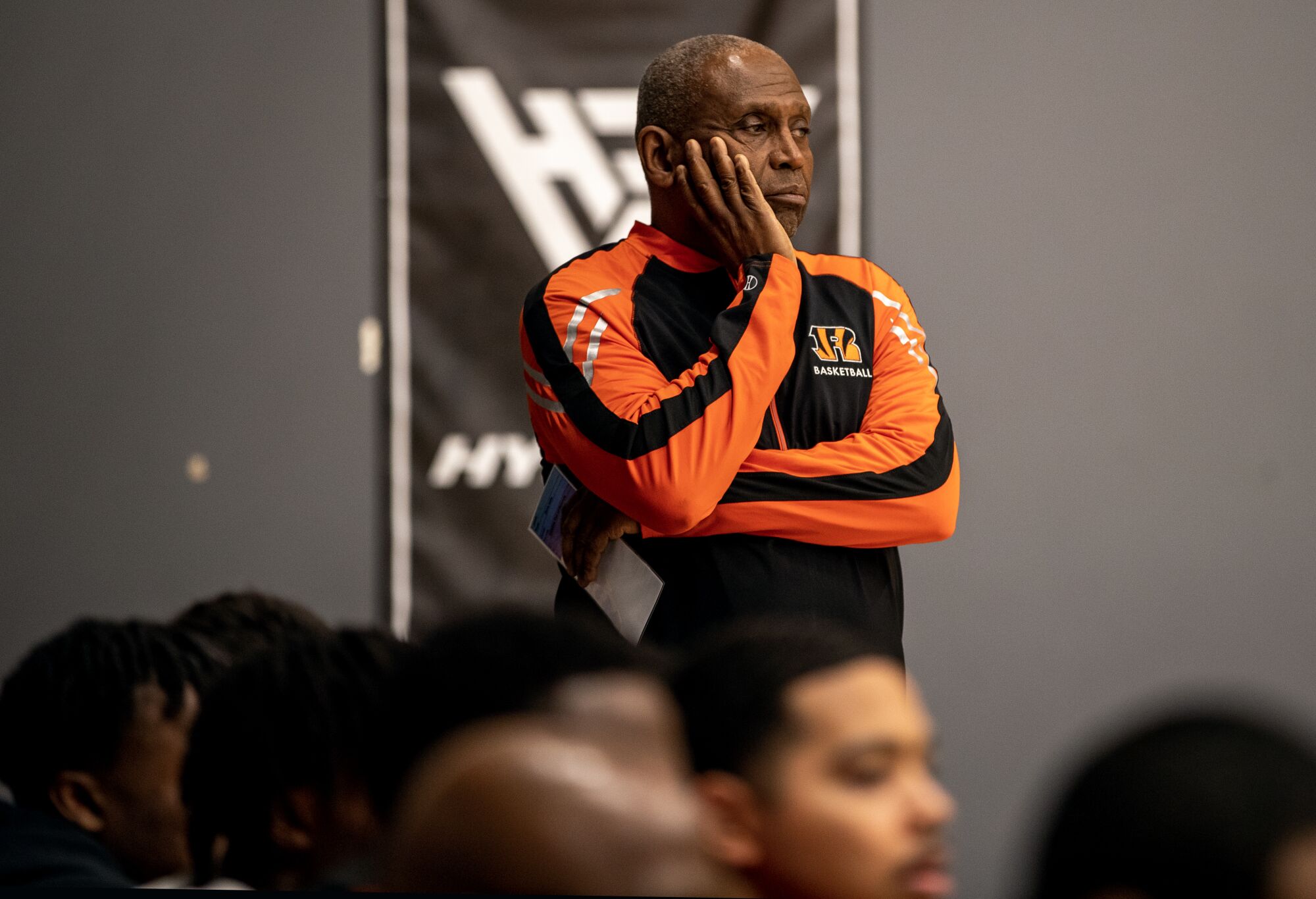 Riverside Community College basketball coach Phil Mathews watches from the bench during a game against Ventura on Dec. 30.