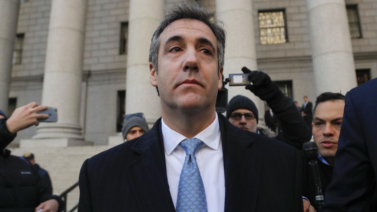 Michael Cohen walks out of federal court on Nov. 29 in New York.