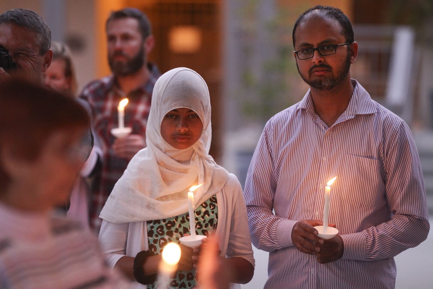 People from the community, many of them of various faiths, join members of the Rancho Bernardo Community Presbyterian Church in a candlelight vigil for the Chabad of Poway synagogue shooting victims.
