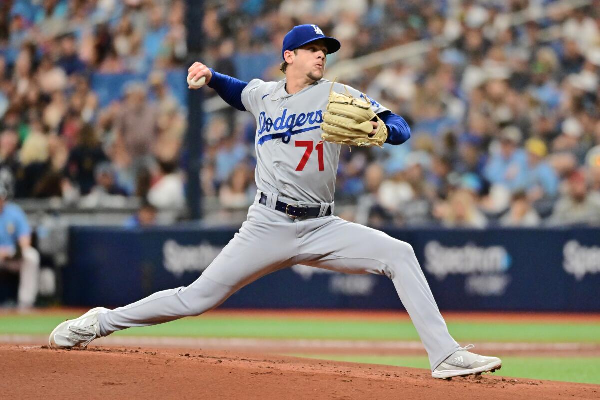 Dodgers pitcher Gavin Stone delivers during the first inning of an 11-10 loss.