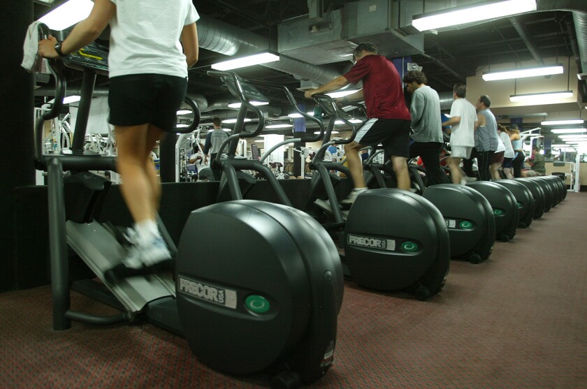 Gyms remain open, but health officials urge precautions to avoid the coronavirus.