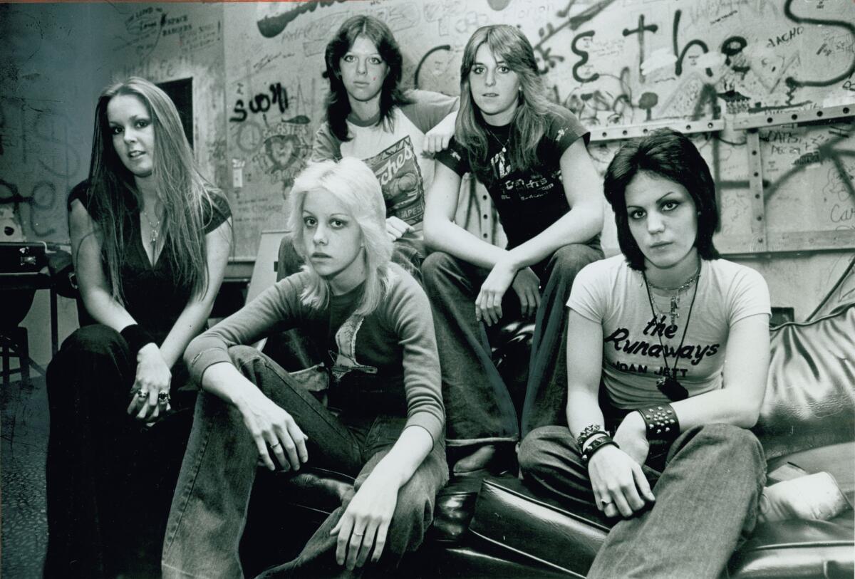 The Runaways, from left, Lita Ford, Cherie Currie, Jackie Fox, Sandy West and Joan Jett in the Whisky s dressing room in 1977. (Los Angeles Times)