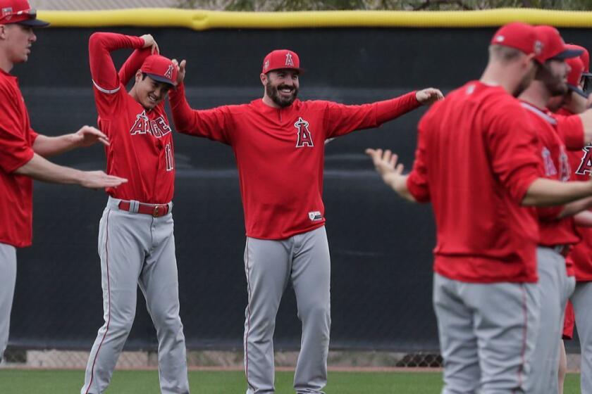 TEMPE, ARIZONA, WEDNESDAY, FEBRUARY 14, 2018 - Angels pitcher Blake Parker stretches with teammates during a spring training session at Tempe Diablo Stadium. (Robert Gauthier/Los Angeles Times)