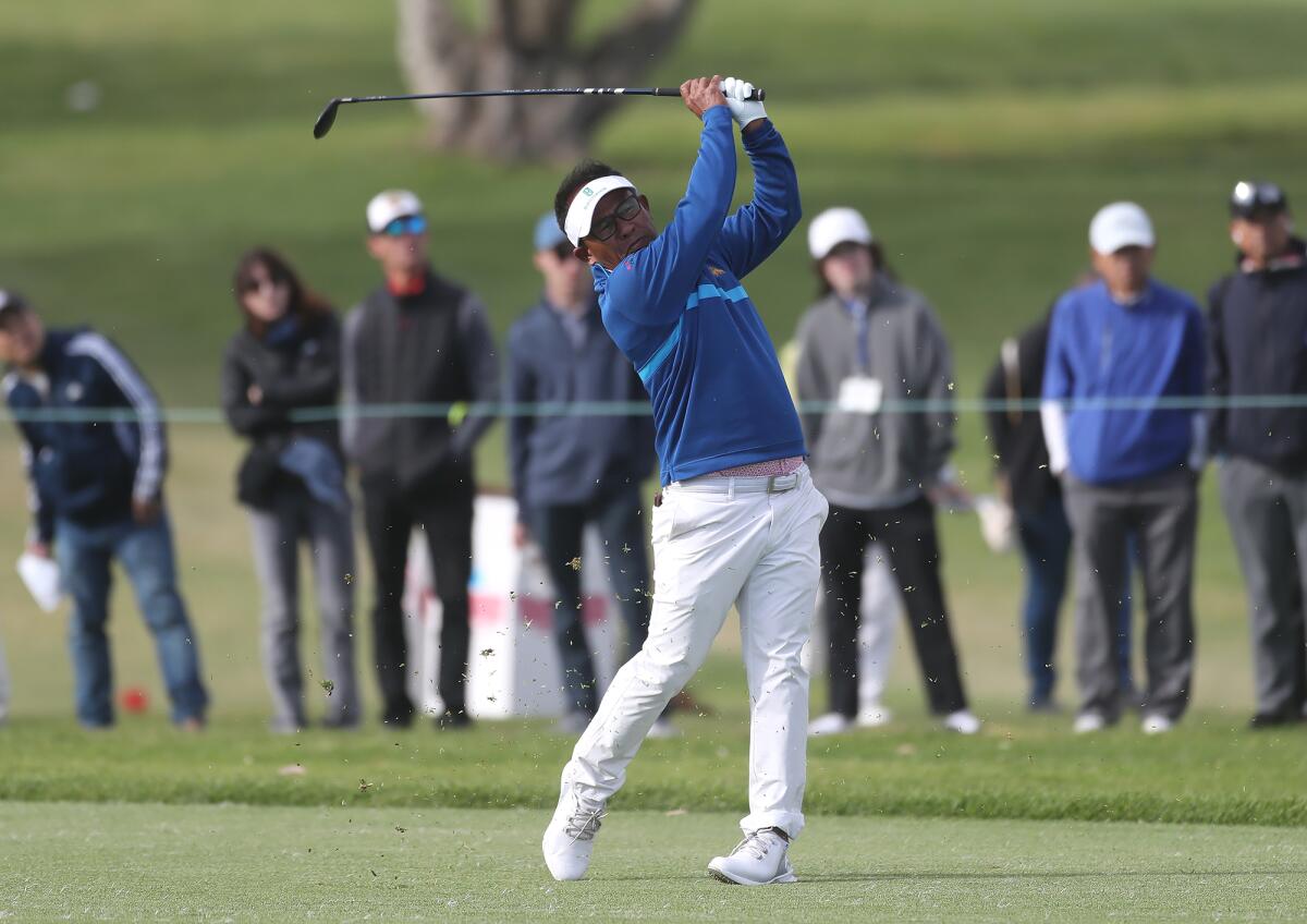 Thongchai Jaidee hits an approach shot to the 18th hole during the final round of the Hoag Classic on Sunday.