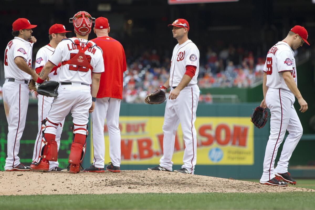 Nationals relief pitcher Jonathan Papelbon (58) walks off the mound for the final time this season on Sunday. He is suspended for the team's final seven games.