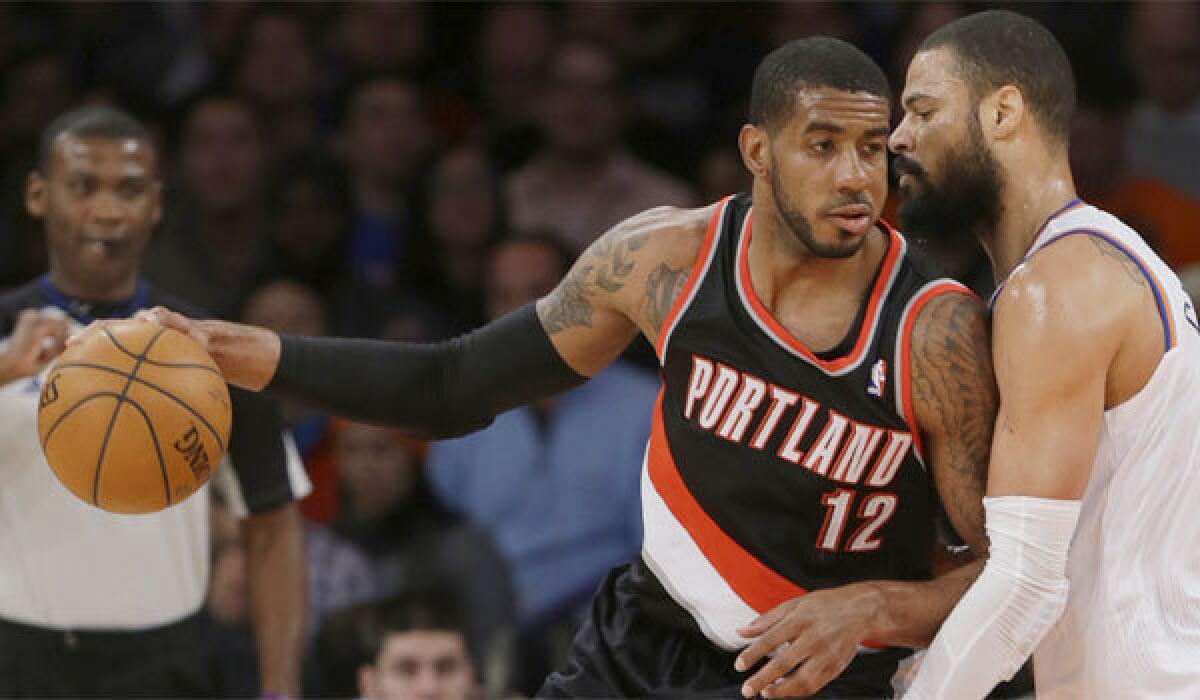 Portland's LaMarcus Aldridge takes on New York's Tyson Chandler on Feb. 5.