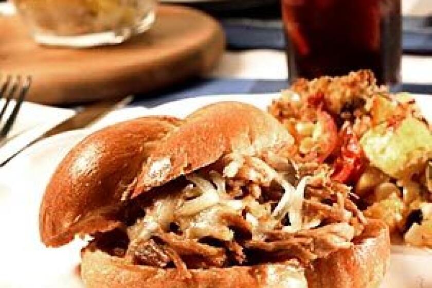 Recipe: Chipotle-orange pulled pork on brioche rolls.