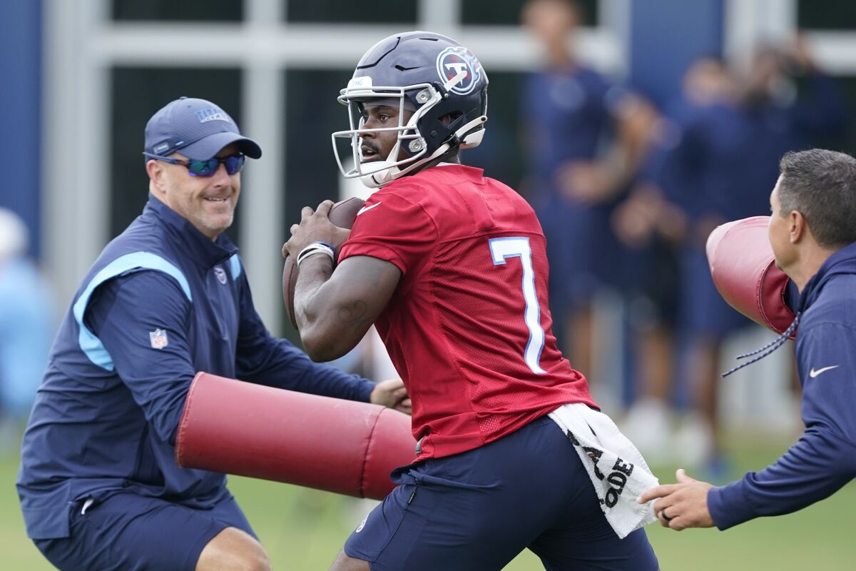 Tennessee Titans quarterback Malik Willis (7) takes part in drills during training camp at the NFL football team's practice facility Wednesday, July 27, 2022, in Nashville, Tenn. (AP Photo/Mark Humphrey)