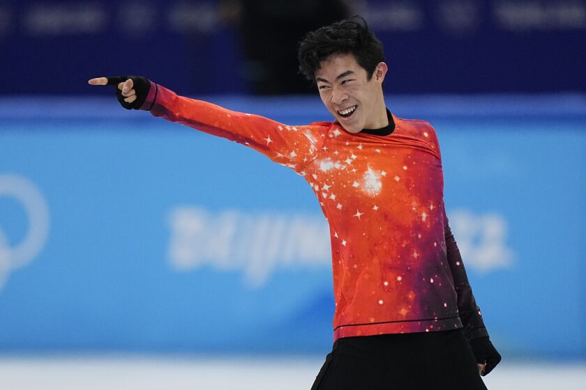 Nathan Chen, of the United States, competes in the men's free skate program during the figure skating event at the 2022 Winter Olympics, Thursday, Feb. 10, 2022, in Beijing. (AP Photo/David J. Phillip)