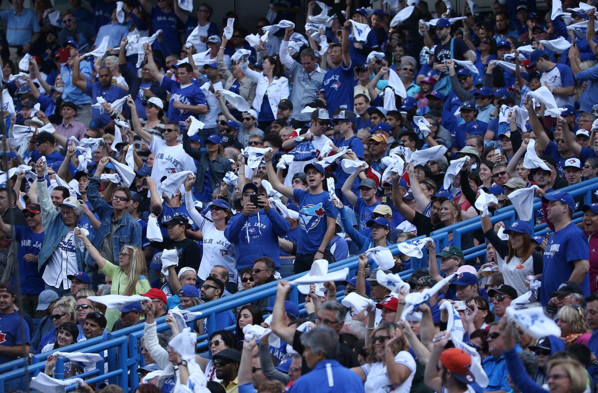 Toronto Blue Jays fans show their support during a game against Tampa Bay at the Rogers Centre on Saturday.