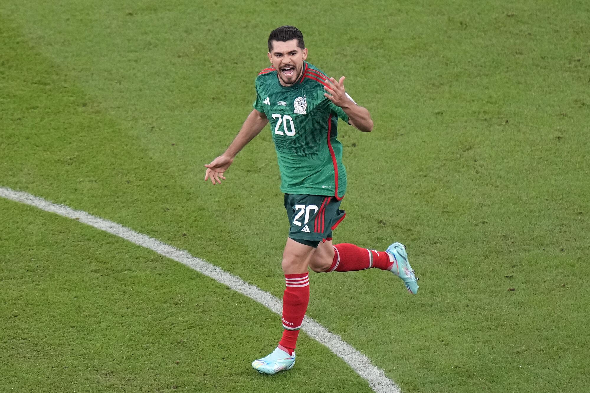 Mexico's Henry Martin celebrates after scoring the opening goal against Saudi Arabia.