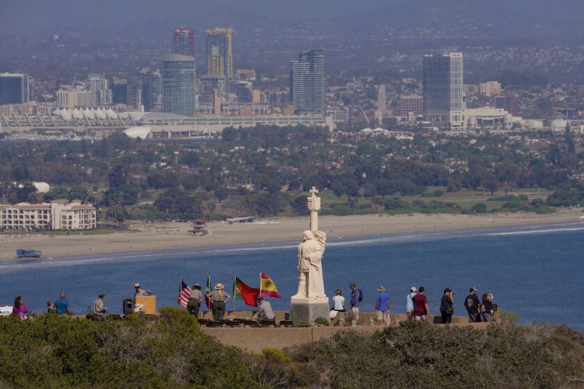 San Diego, CA - September 30: At Cabrillo National Monument on Friday, Sept. 30, 2022 in San Diego, CA., tourist enjoy the view point before the arrival of guest for the wreath-laying ceremony held near the Juan Rodríguez Cabrillo statue at the Cabrillo National Monument. (Nelvin C. Cepeda / The San Diego Union-Tribune)