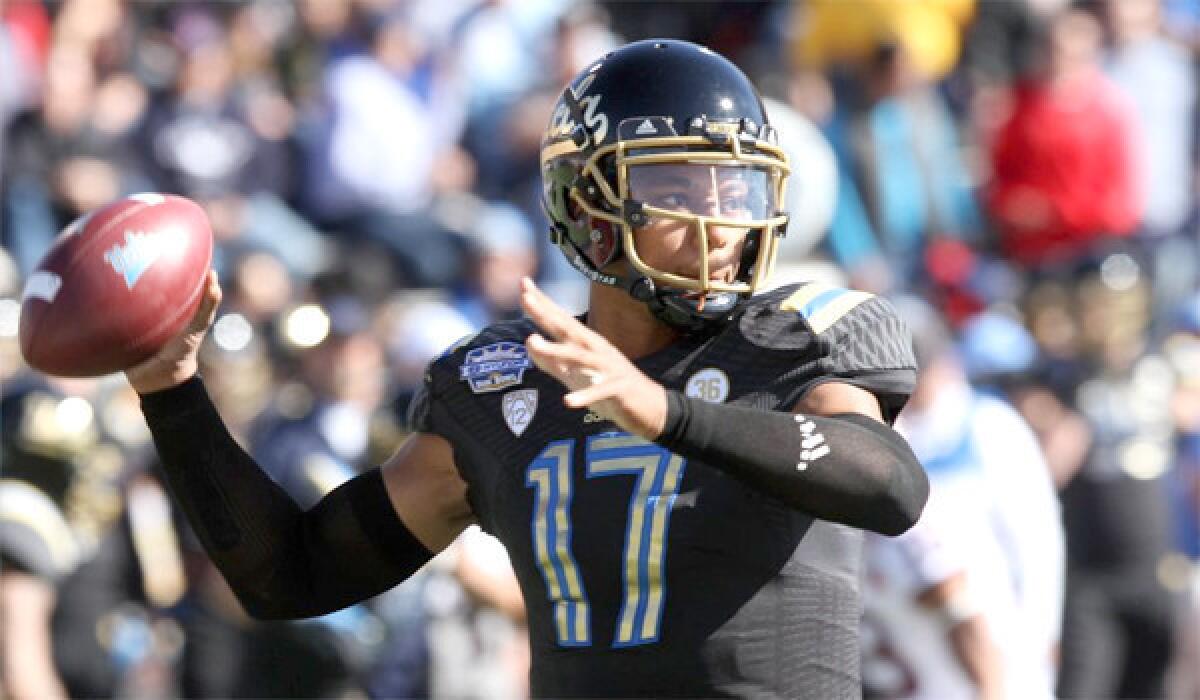 UCLA quarterback Brett Hundley looks to pass during the first quarter of the Hyundai Sun Bowl on Dec. 31. UCLA defeated Virginia Tech, 42-12.